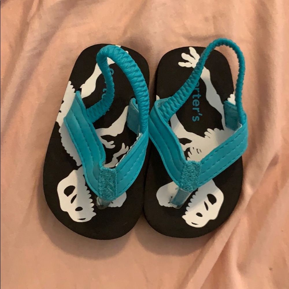 Dinosaur flip flops